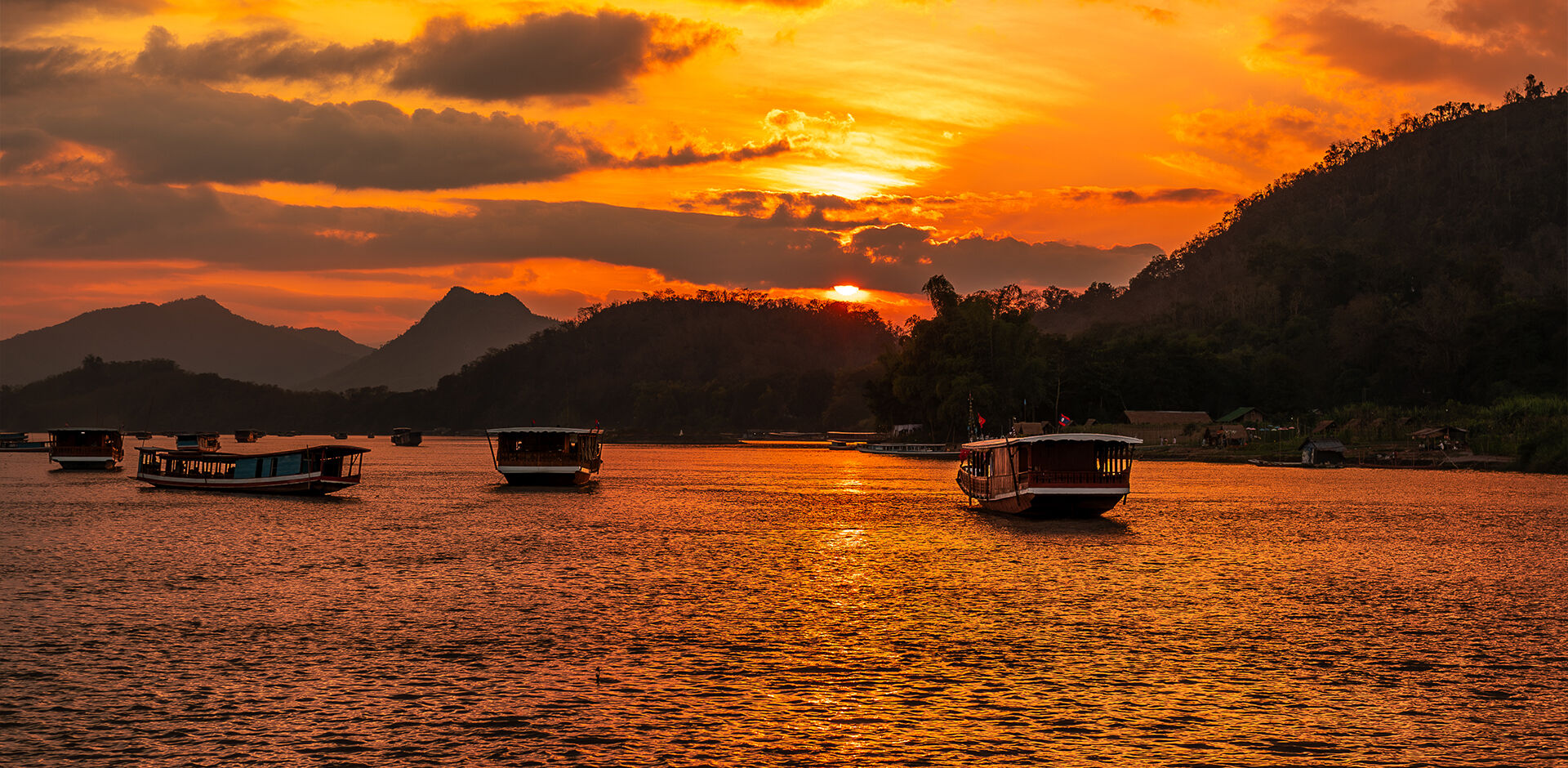 Launch your Vietnam Laos Thailand tour from Hanoi’s serene waters